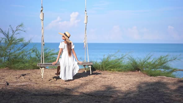 Asian woman enjoy around beautiful beach sea ocean