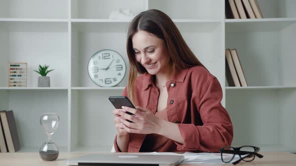 Phone Message Happy Young Woman with Charming Smile Hold Smartphone