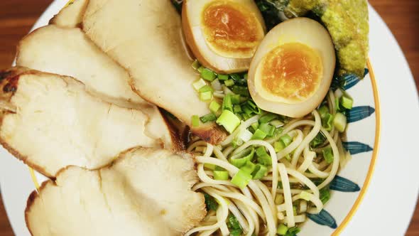 Japanese Ramen Asian Soup Noodle with Beef or Chicken Meat Mushroom and Eggs Chef Cooking in