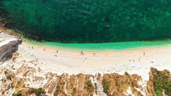 Aerial Top View of White Tropical Beachrocky Cliffsblue Sea Deep White Cliffs