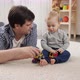 Father lying with his baby son on carpet and playing - VideoHive Item for Sale