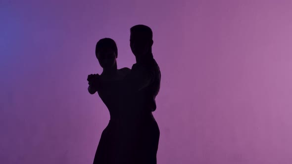 Elements of Argentine Tango Performed By Pair of Dancers
