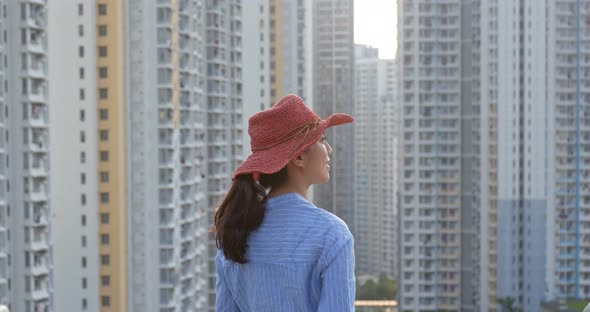 Woman look around the city in the evening