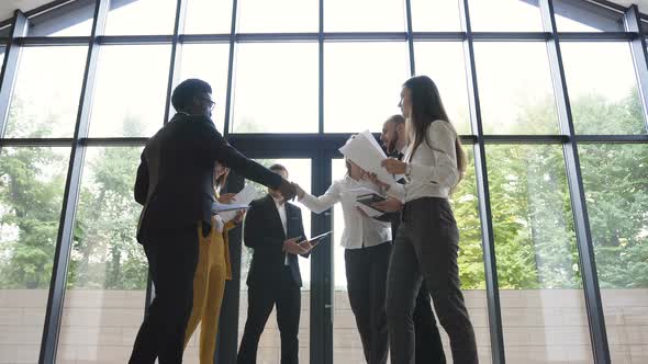 Confident and Attractive Young Multi Ethnic Business Team Meet 