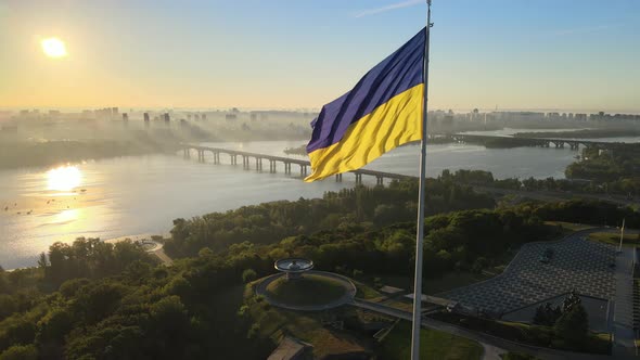 Ukrainian Flag in the Morning at Dawn. Aerial. Kyiv. Ukraine