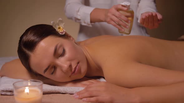 Close Up of Woman Having Back Massage at Spa