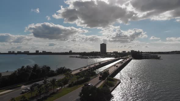 Sundown drone flight toward the yachts in Sarasota, Florida.  Breathtaking John Ringling causeway tr