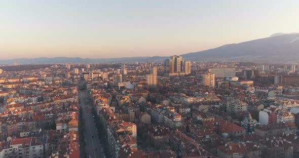Red Rooftops at Sunset Against Mountain in Sofia, Bulgaria alt
