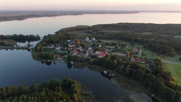 Sunset flight over Sniardwy lake in Masuria region (Masuria), Poland, Europe
