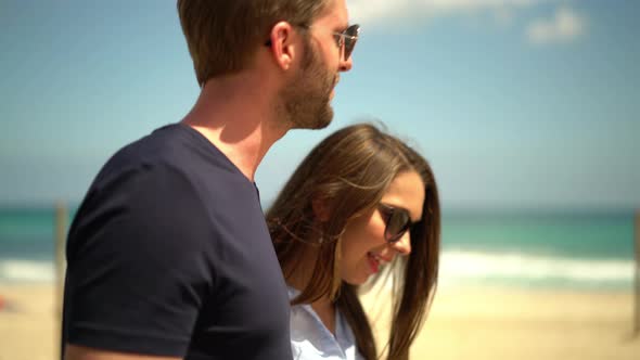 Side View Couple Walking Along Promenade