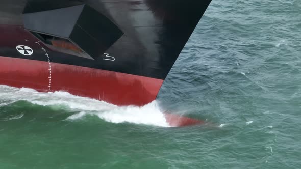 Container Ship Bow in the Ocean Aerial View