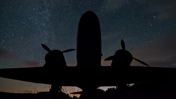 Stars Milky Way over Plane Silhouette of Military Aircraft in Starry Night Sky Astronomy