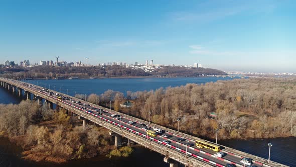 The Patona Bridge Car Traffic at the Autumn Time Bare Trees Without Leaves Aerial View