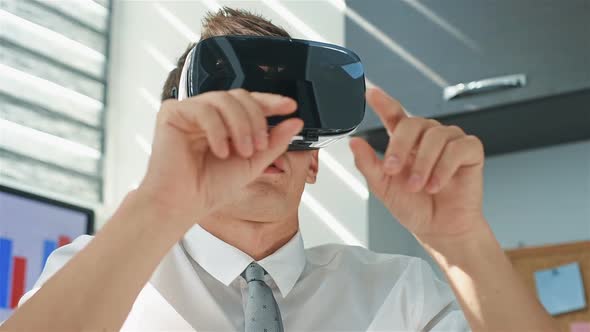 Businessman Wearing Virtual Reality Googles