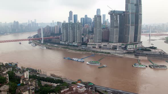 Chongqing City River Cityscape with Bridges Aerial China Timelapse Pan Up