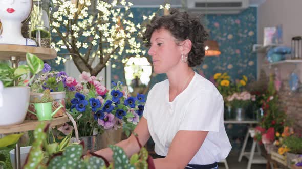 Florist working in flower shop