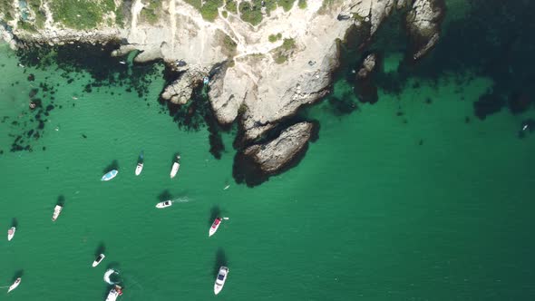 Aerial Panoramic View of Seascape with Crystal Clear Azure Sea and Rocky Shores