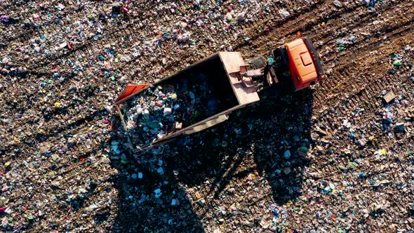 Truck Unloading Garbage Waste at Landfill Junkyard