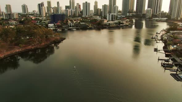 Early Morning ,Surfers Paradise,  stand up paddle boarder on a peaceful canal