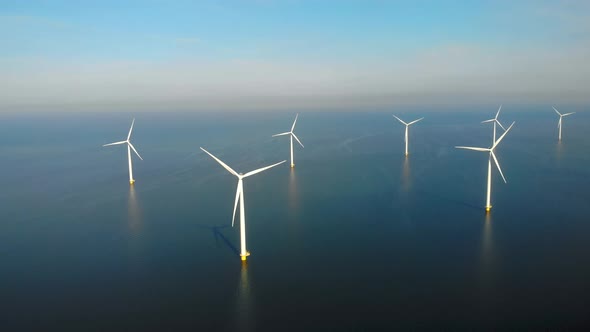 Windmill Park in the Ocean Drone Aerial View of Windmill Turbines Generating Green Energy Electric