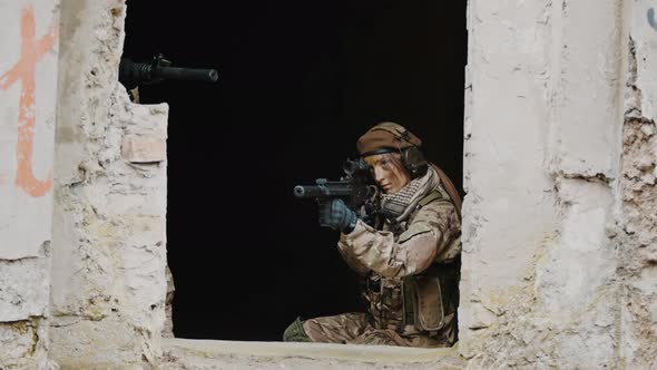 Team of Female Snipers Occupying the High Spot in Abandoned Building