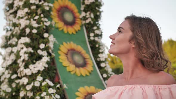 A Girl Walks Through a Beautiful Fairytale Park in Dubai