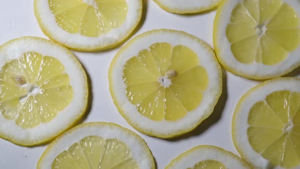 Background of Sliced Lemon Rings Slices of Fresh Yellow Lemons