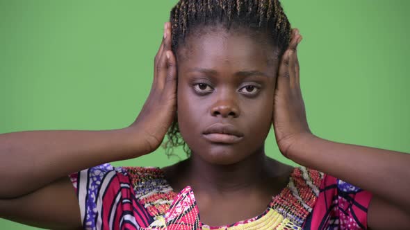 Young African Woman Doing Three Wise Monkeys Concept