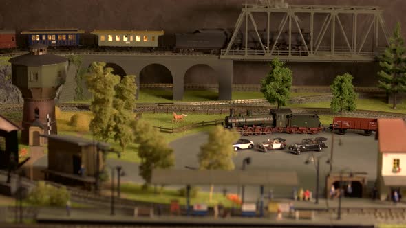 Model Train Moving on the Bridge.