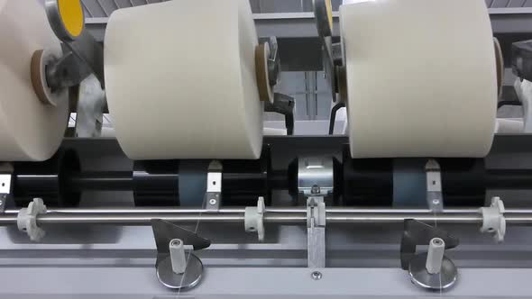 Production of Threads in a Textile Factory