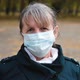 Portrait of a Senior Woman in a Medical Protection Mask - VideoHive Item for Sale