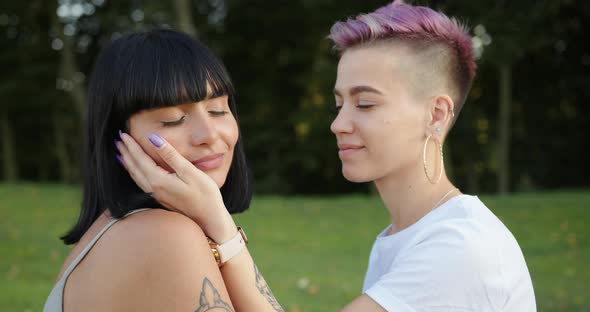 Portrait of Lesbian Woman Kissing Her Girlfriend