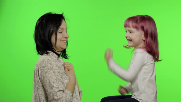 Mother and Little Daughter Laughing, Playing Together. Chroma Key. Mothers Day