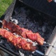 Puts skewers with pieces of meat on the grill - VideoHive Item for Sale