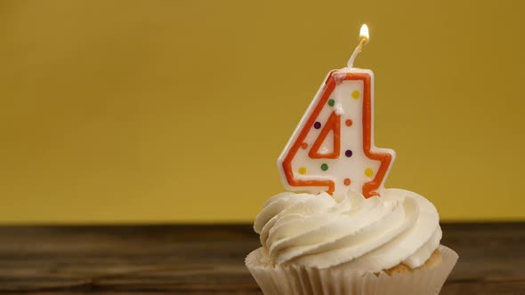 Cupcake With Number 4 Candle