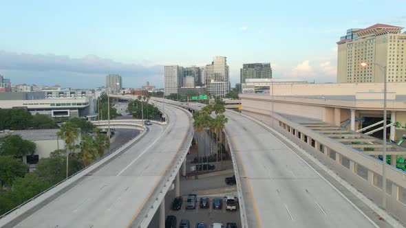 Cars driving on bridge highway arriving to Tampa downtown