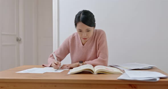 Asian Woman study at home