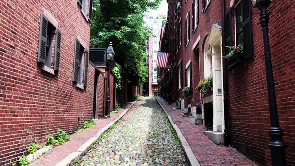 Boston Beacon Hill Acorn Street neighborhood with brown brick federal-style rowhouses and narrow cob