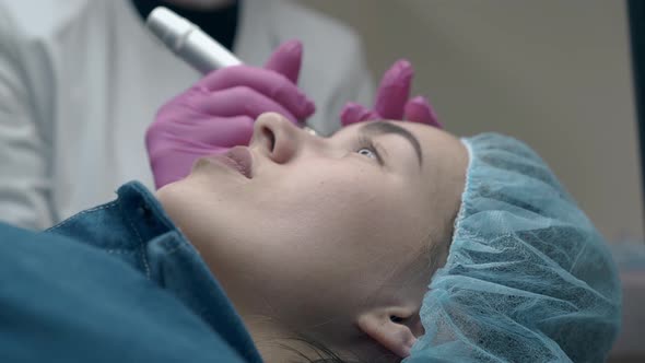 Blue Eyed Lady Talks To Cosmetologist in Beauty Salon