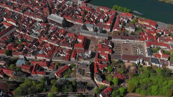 Beautiful top view of the old part of the city. Spring. Green leaves on the trees.