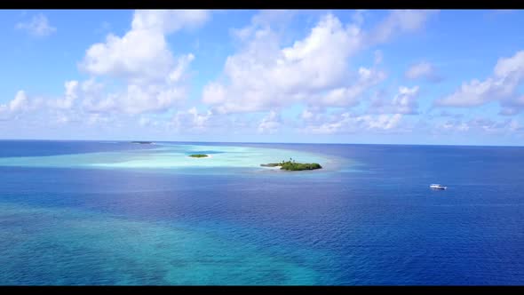 Aerial view seascape of marine shore beach journey by blue lagoon with white sandy background of a d