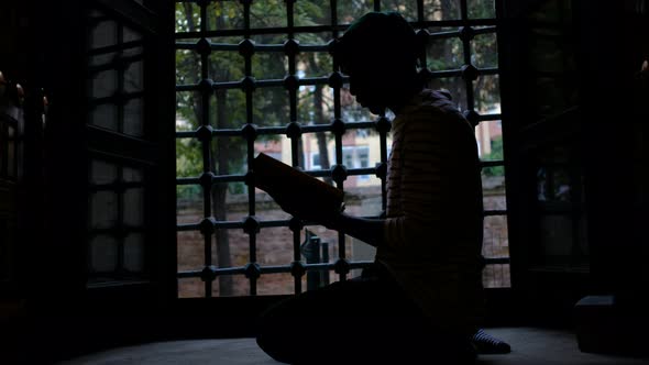 Reading Quran Silhouette