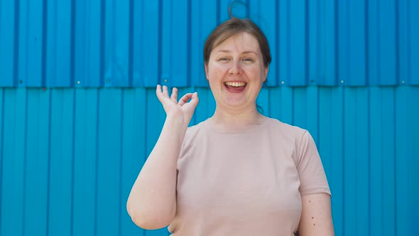 Positive Confident Woman Shows Ok Sign to the Camera Slow Motion