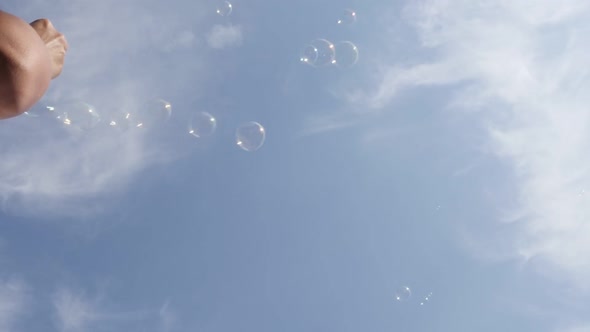Cloudy blue sky and air soap bubbles flying in slow motion relaxing 1920X1080 FullHD footage - Soap 