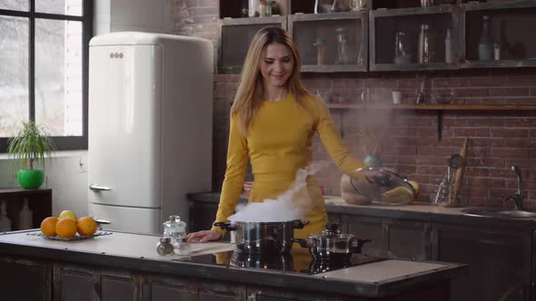 Female Enjoy Cooking Lunch in Apartment.