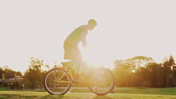 Biker Stunt Performer Effectively Performs Stunts on a Bicycle