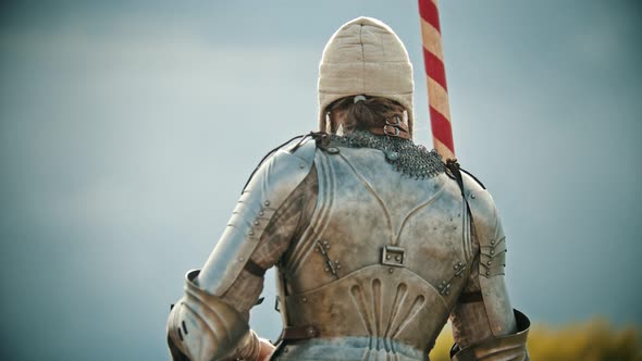 A Man Knight in the Armor Holding a Spear