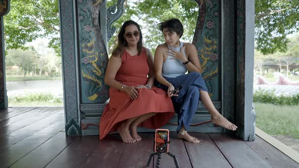 Women Vloggers Recording Video For Travel Channel In Ancient City Museum Park Thai Ban Mai Thailand