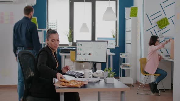 Businesswoman Enjoying Food Meal Order in Company Office During Takeout Lunchtime Break