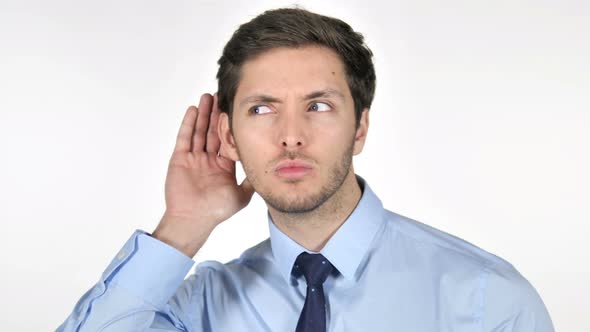 Young Businessman Listening Secret, White Background